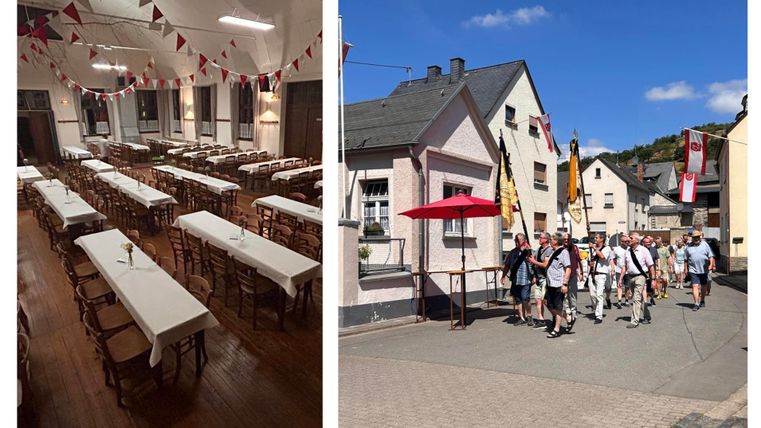 Ein festlich dekorierter Saal mit langen Tischen und Bänken. Auf der anderen Seite gehen Menschen an bunten Häusern vorbei.